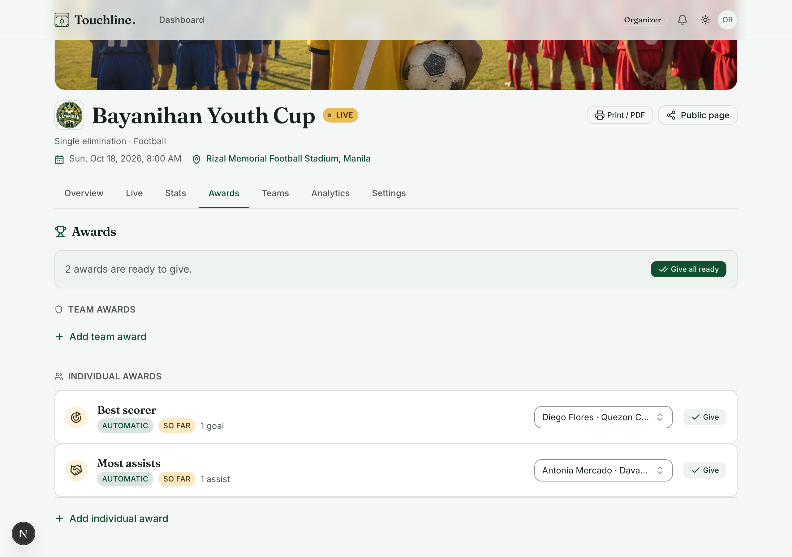 Touchline working out the tournament awards from the results